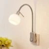 Lindby Aeryn Steckdosenleuchte, Flexarm, Schalter